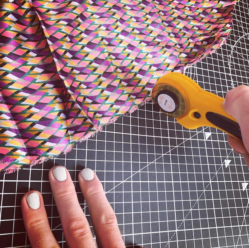 close up image of fabric cutting on a grid